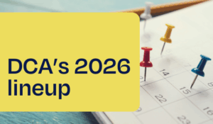 A calendar with pushpins to indicate key dates with the words "DCA's 2026 lineup"