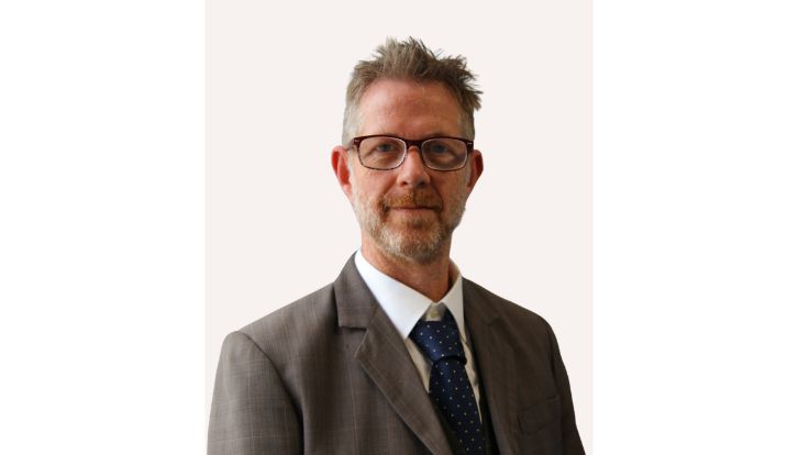 Photo of Quincy Hall (he/him).