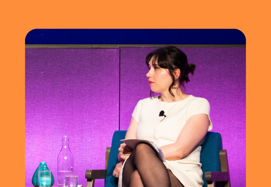 Rose sitting at an event as a panel chair